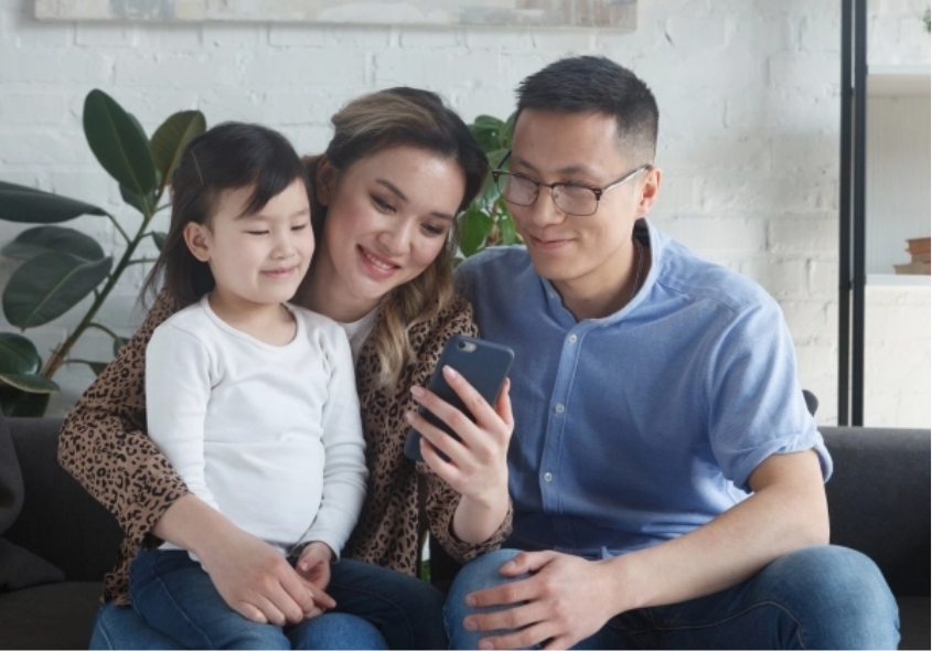 expat family remitting money with smiles