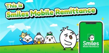 This is smiles mobile remittance, tori family excited and one of them holding he Smiles Mobile Remittance app.